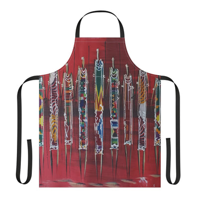 The Warriors Apron – Red apron featuring tall, abstract African warrior figures in colorful traditional patterns on bold red background